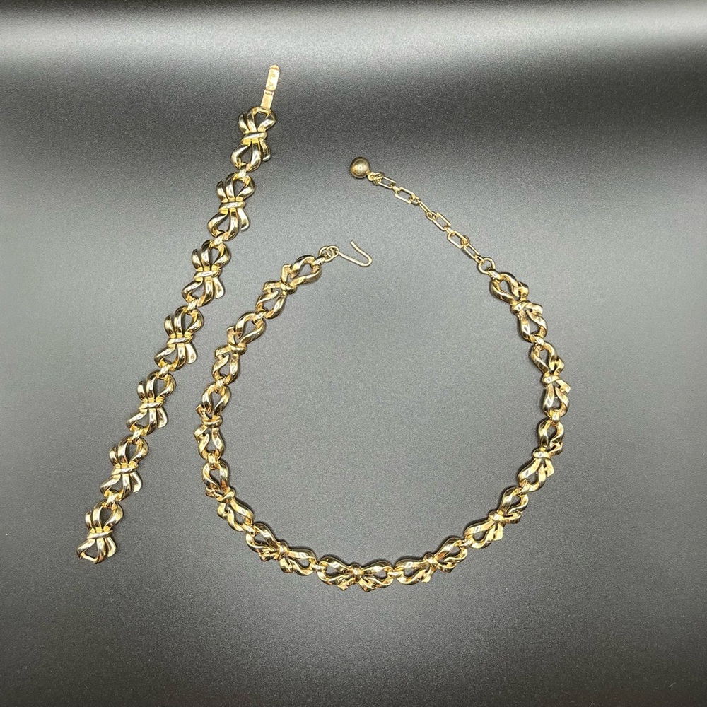 Crown Trifari Gold Tone Bow Necklace and Bracelet